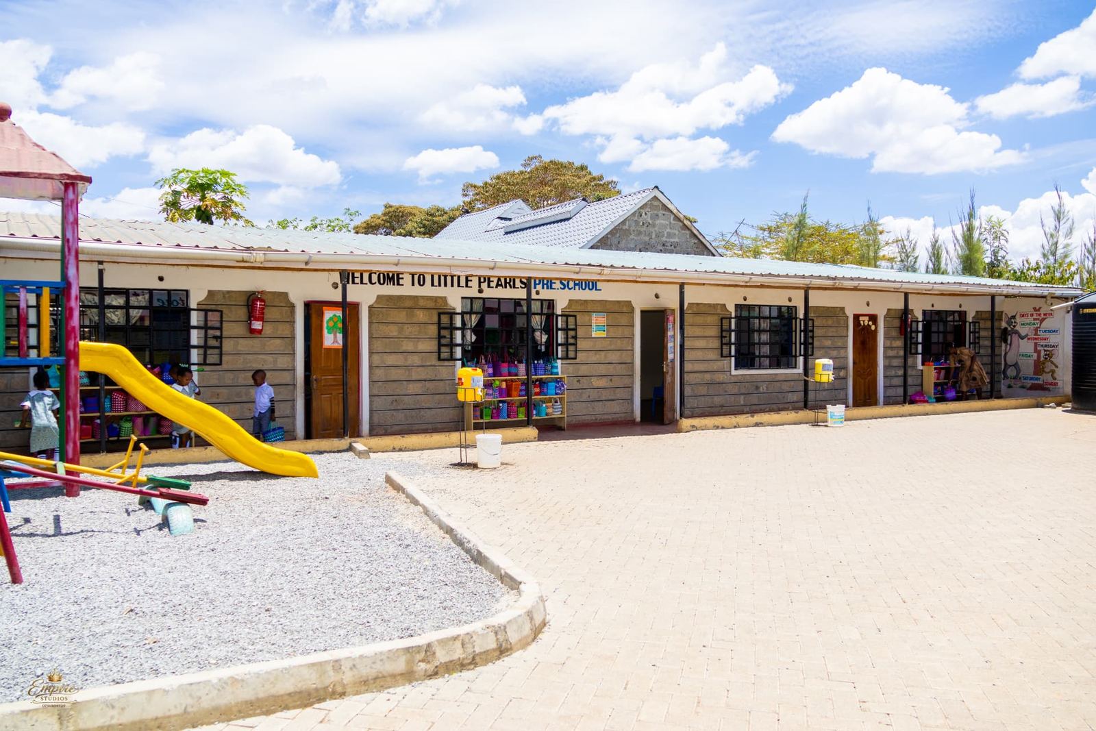 The Little Pearls pre-school block with its slide and outdoor play area